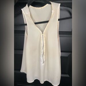 White silk tank top. Zipper down the chest, elegant fit. Polyester. SMALL